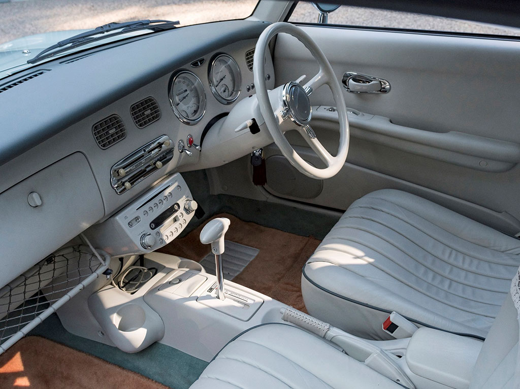 1991 Nissan Figaro uniquement avec le volant à droite. 1991 Nissan Figaro uniquement avec le volant à droite.