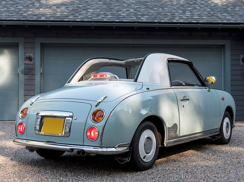 1991 Nissan Figaro vue de trois quarts arrière droit. 1991 Nissan Figaro vue de trois quarts arrière droit.